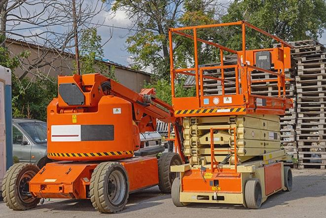 industrial forklift transporting goods in a warehouse in Butte Des Morts WI